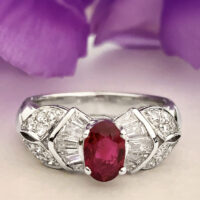 14K white gold ruby and diamond ring with oval ruby and baguette diamonds